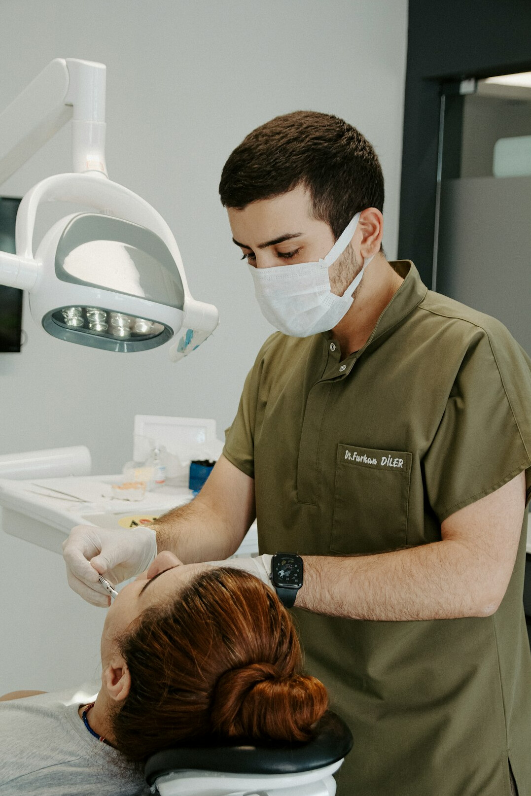 Dentist examining a patient's teeth in a dental clinic